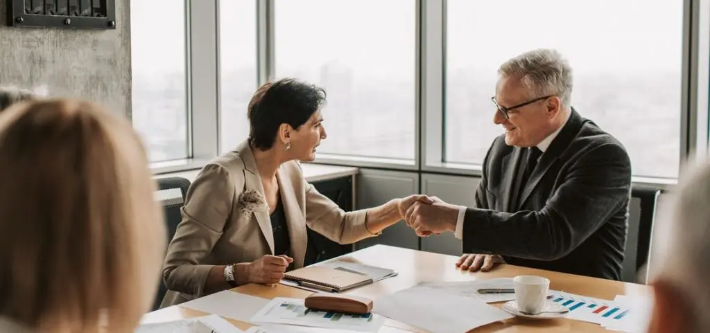 Man and Woman Shaking Hands