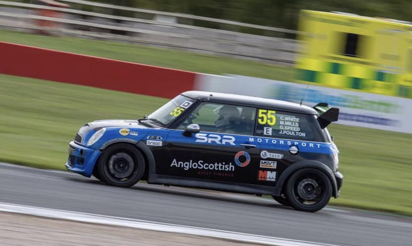 Anglo Scottish sponsored race car on a race track